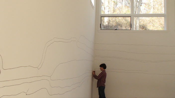 Hannah Lamar Simmons, working on New York Times installation