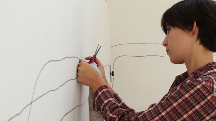 Hannah Lamar Simmons, working on New York Times installation